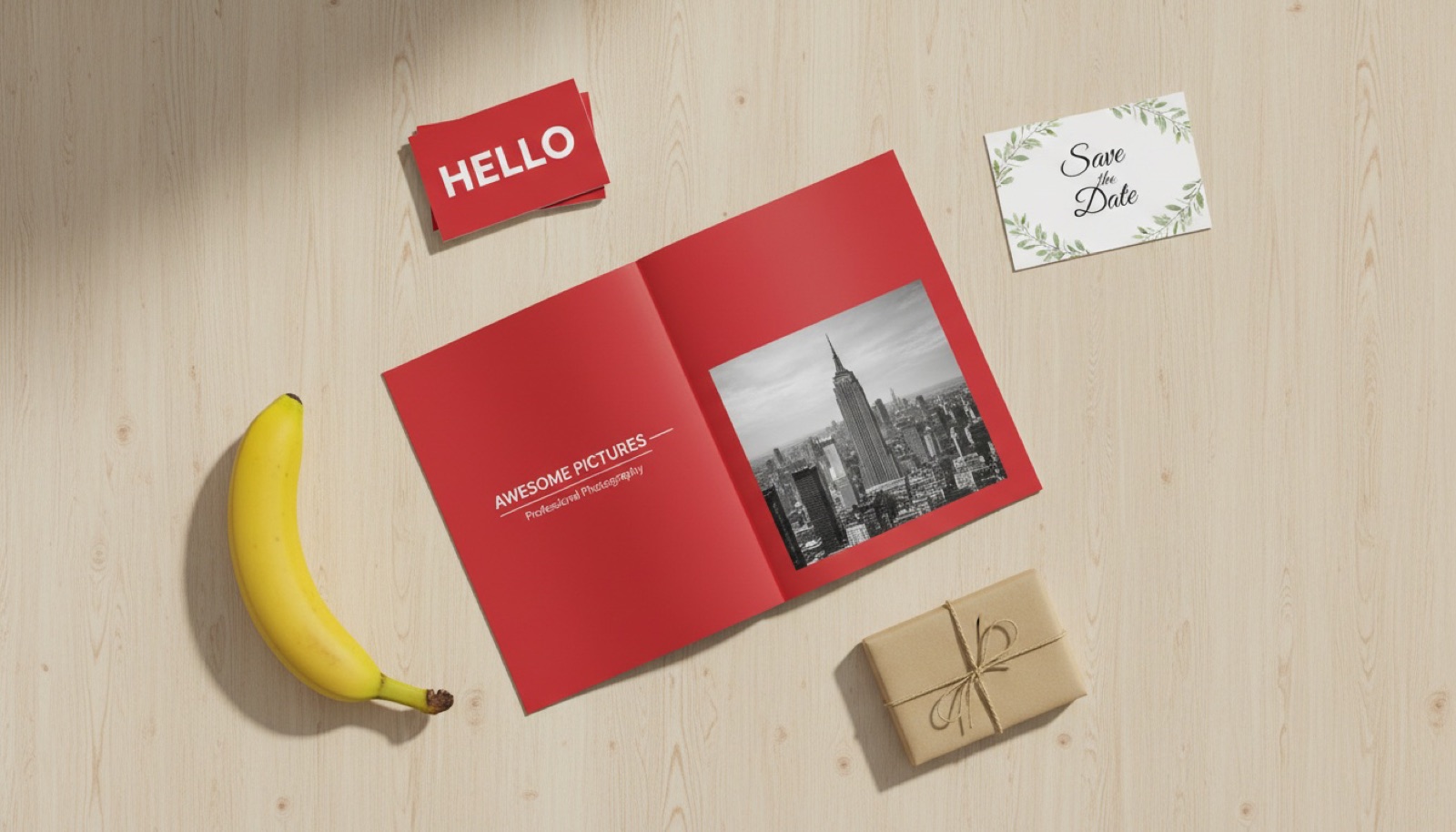 Custom-quoted marketing collateral including HELLO business cards, an AWESOME PICTURES brochure, and printed packaging