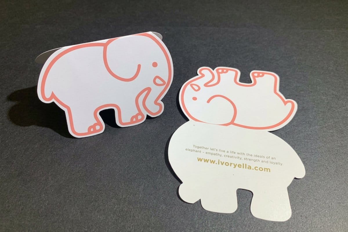 Custom die-cut stickers in assorted shapes printed by 4OVER4