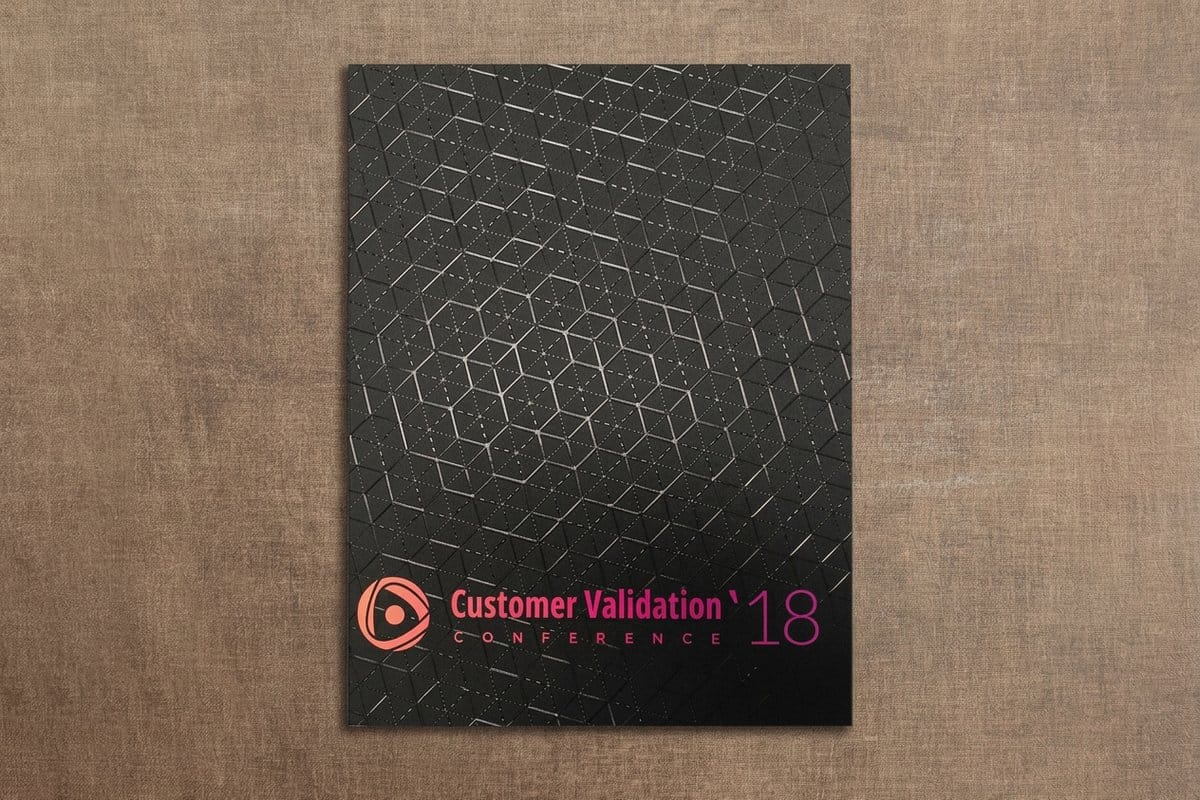Raised spot UV pocket folders printed by 4OVER4 with a tactile glossy finish