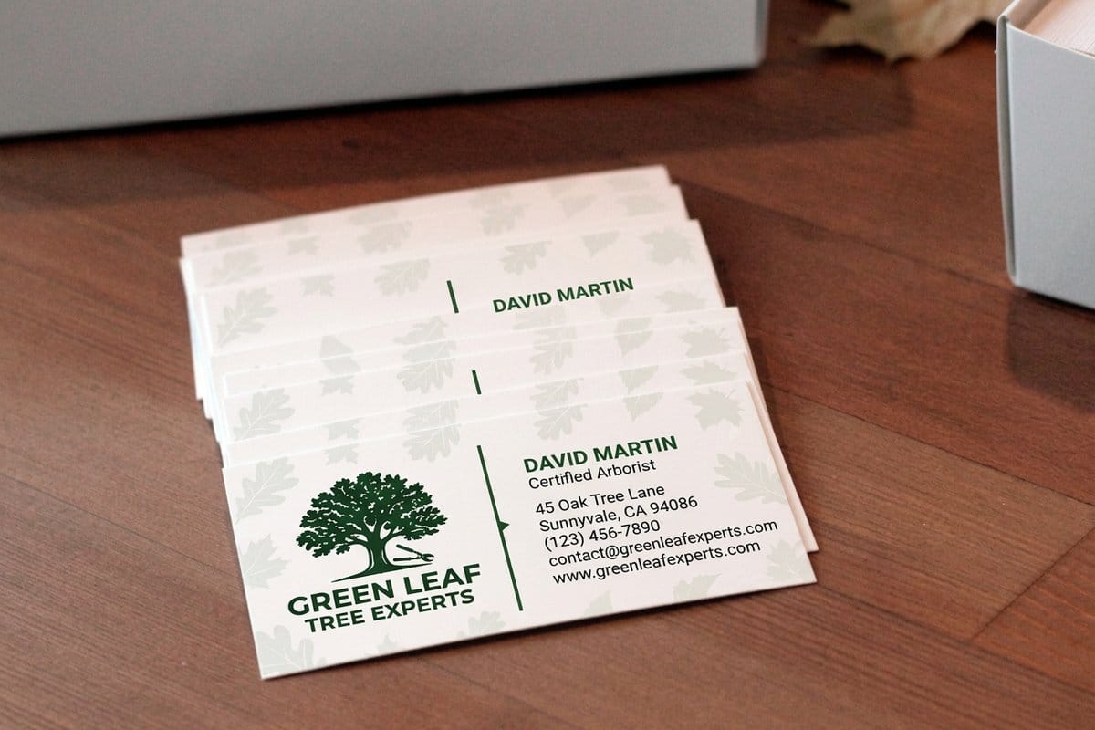 Tree service business cards printed by 4OVER4, a light dense box that expedites cheaply when a crew needs cards for Monday