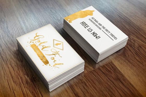Real 4OVER4 foil business card printed for a customer, copper and metallic detail, example 10