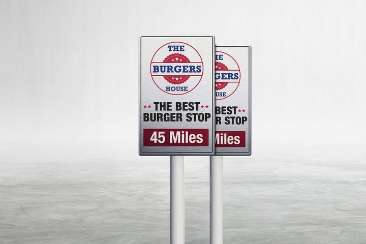 Aluminum signs printed by 4OVER4 marking air, water, and restrooms at a gas station