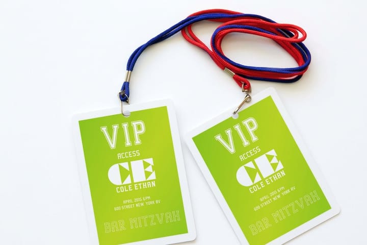 Event badges printed by 4OVER4 identifying trade show booth staff