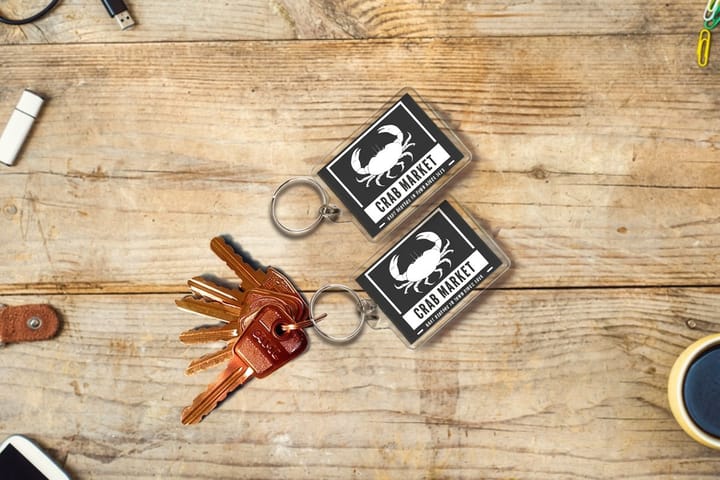 Standard keychains printed by 4OVER4 as an auto shop key-return giveaway