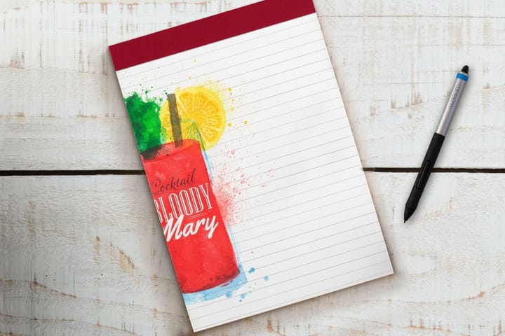 Standard notepads printed by 4OVER4 with a real estate office header