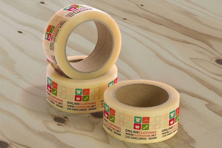 White and clear polypropylene packaging tape from 4OVER4 stacked as full cases