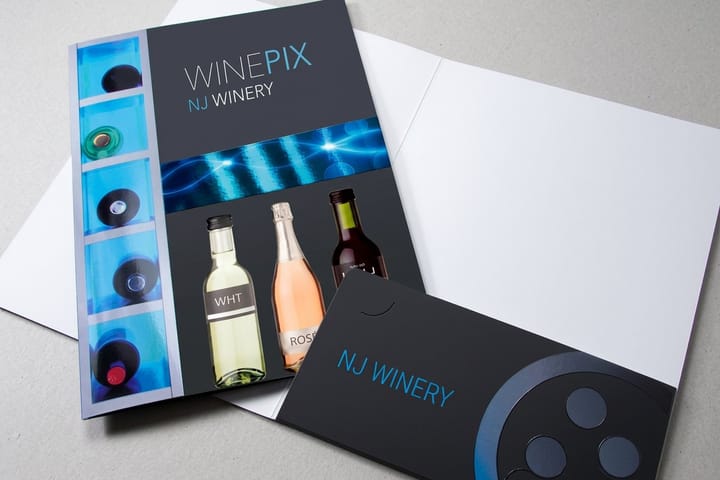 Spot UV presentation folders printed by 4OVER4 for dental lab account presentations