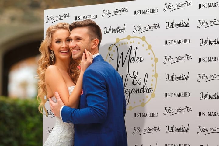 Step-and-repeat banner printed by 4OVER4 as a photo backdrop with repeating logos