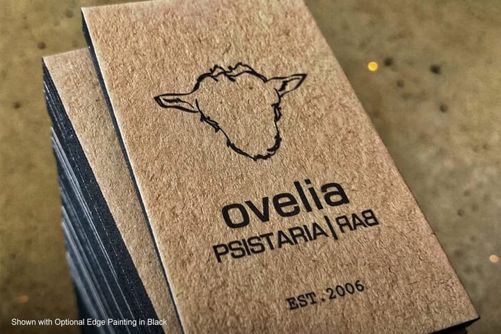 Ultra thick kraft business cards printed by 4OVER4 showing the exposed brown edge of the stock