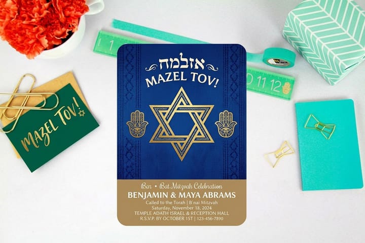 Bar and bat mitzvah invitations printed by 4OVER4 with envelopes on a table