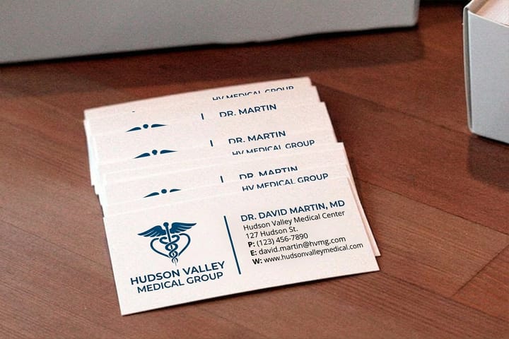 Medical business cards printed by 4OVER4 for a chiropractor