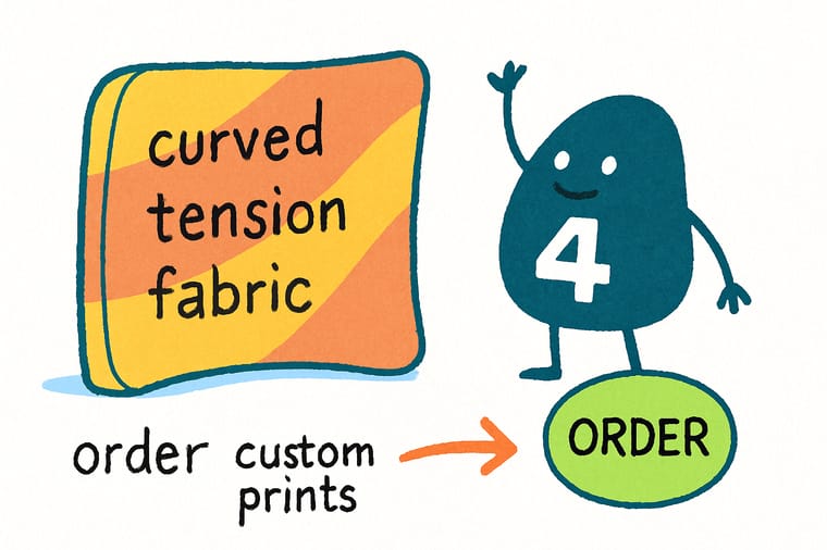 Wally from 4OVER4 standing beside a curved tension fabric display, pointing out the seamless graphic and the arc of the frame