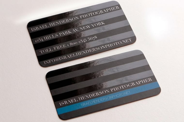 Spot UV business cards from 4OVER4 with a glossy raised finish over a matte surface