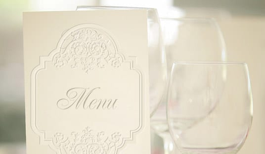 Printed restaurant menu with well-written dish descriptions, printed by 4OVER4