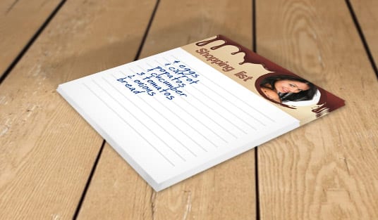 Custom notepad set out for a daily business journaling habit, printed by 4OVER4
