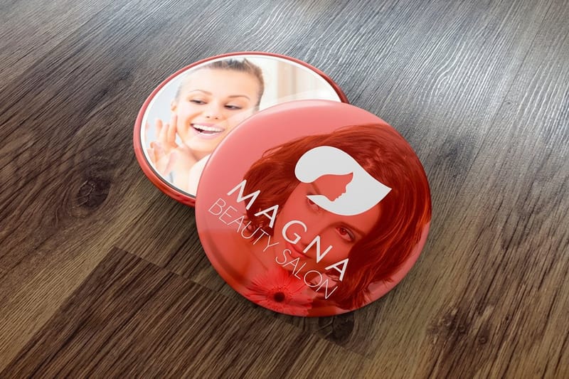 Magnet and pinback buttons handed out at an event by 4OVER4