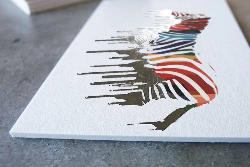 Fat foil business card printed by 4OVER4 on extra-thick stock with a copper foil accent