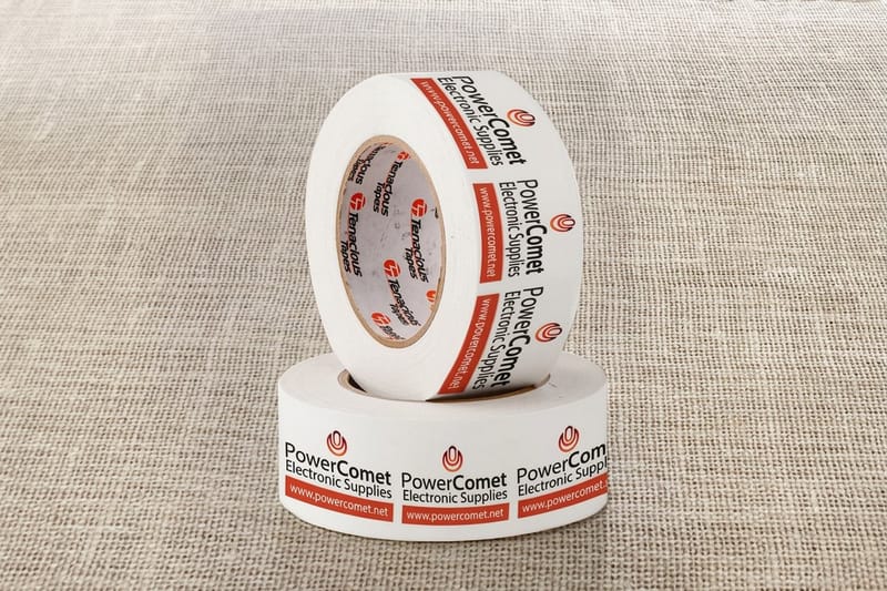 Custom printed packaging tape sealing a branded shipping box by 4OVER4