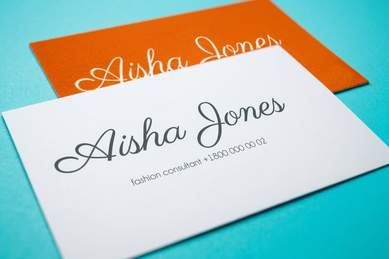 Velvet laminated business card printed by 4OVER4 with a soft matte logo finish