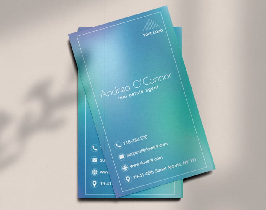 Real estate agent business card with a skyline design by 4OVER4.COM