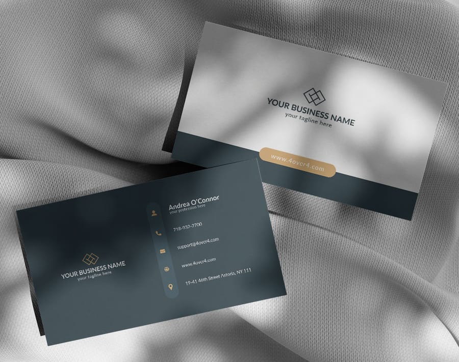 A stack of premium business cards from 4OVER4.COM