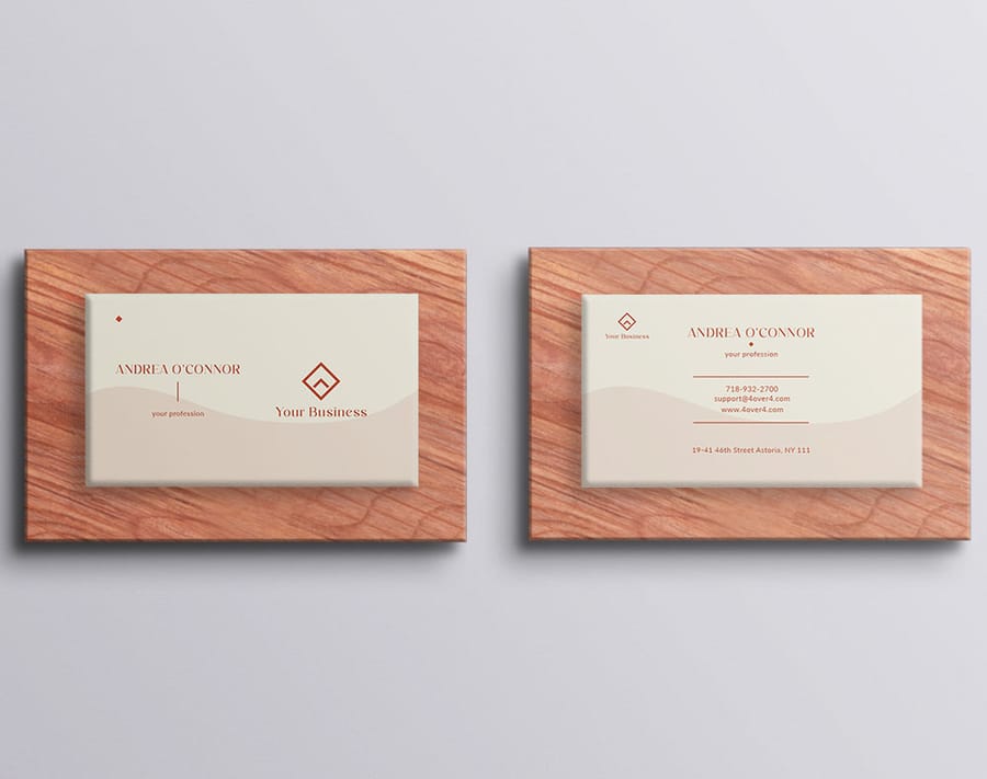 A small business owner's professional business card printed by 4OVER4.COM