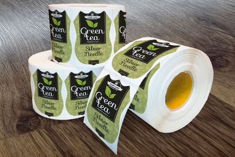 branded stickers and print materials at a local event