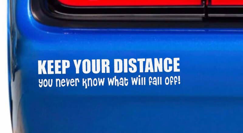 A small custom bumper sticker peeled and ready to apply to a car