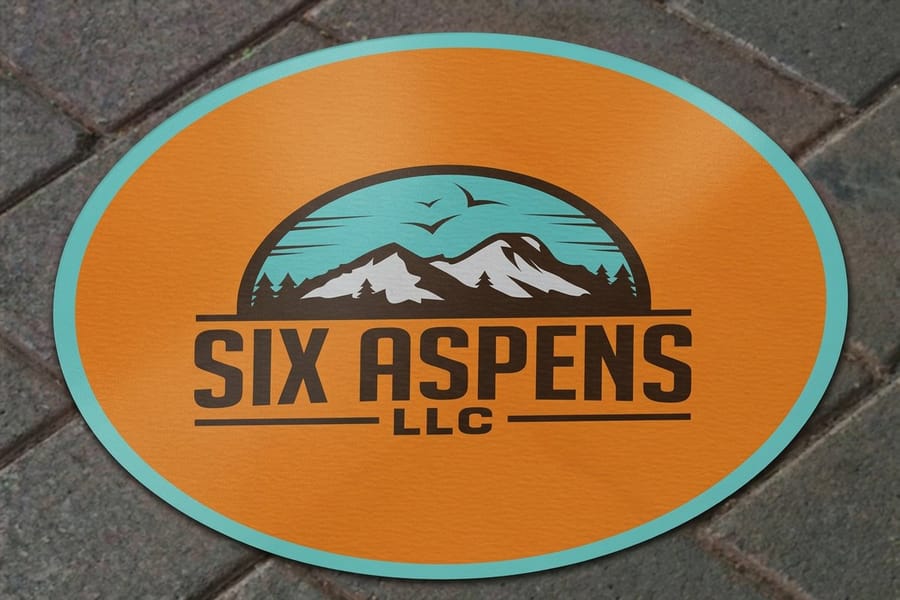 Aluminum floor graphic with an anti-slip laminate installed on a retail floor, printed by 4OVER4