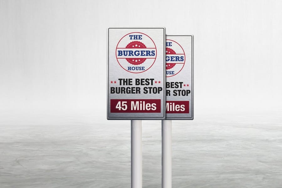 Rigid printed aluminum sign from 4OVER4 mounted outdoors