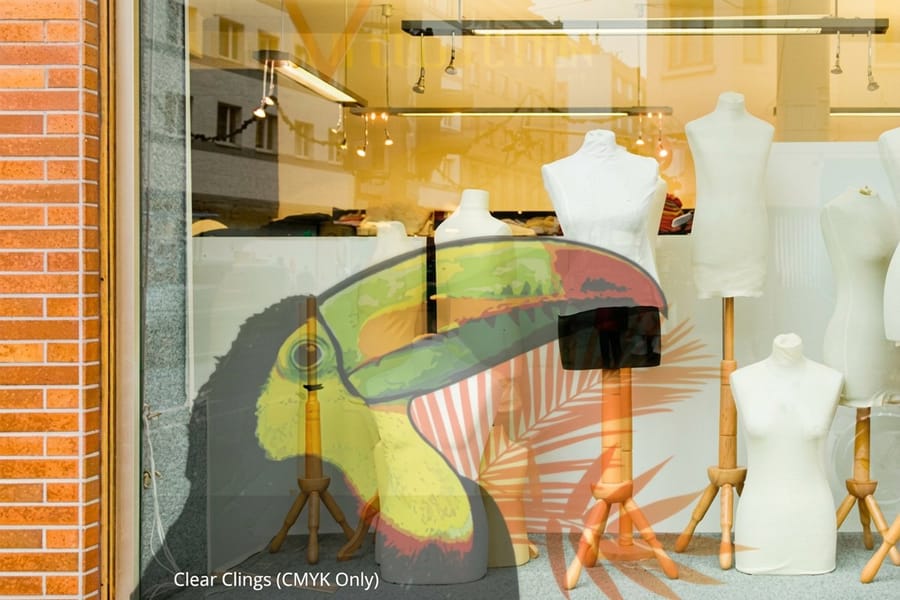 High-contrast window cling artwork on glass, printed by 4OVER4
