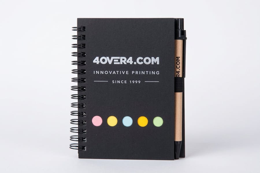 Wire-o bound custom notebook lying flat, printed by 4OVER4