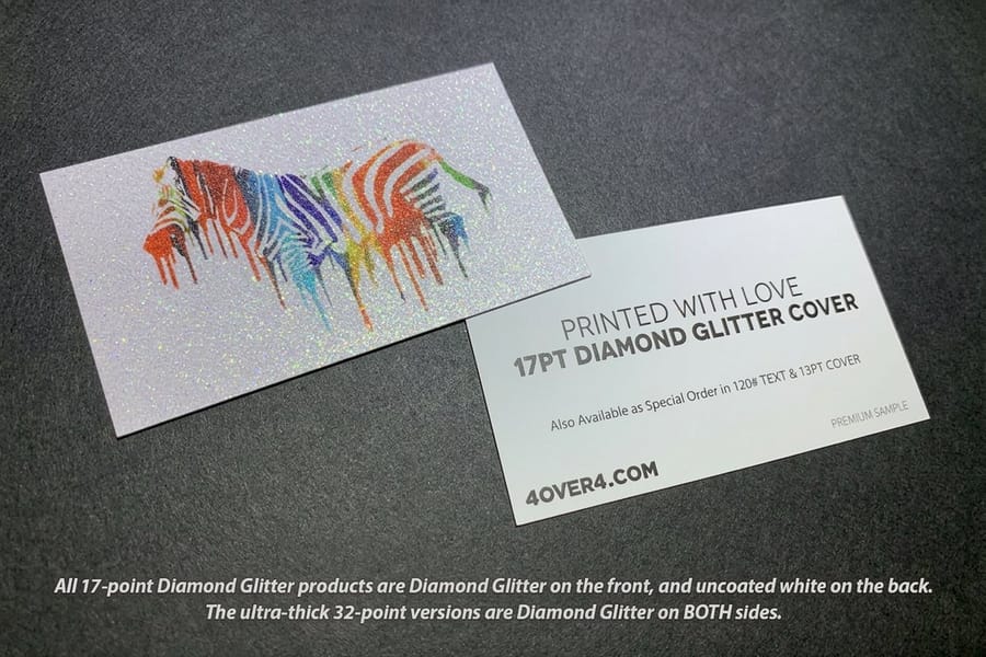 Diamond glitter business cards printed by 4OVER4 stacked to show the plain reverse side