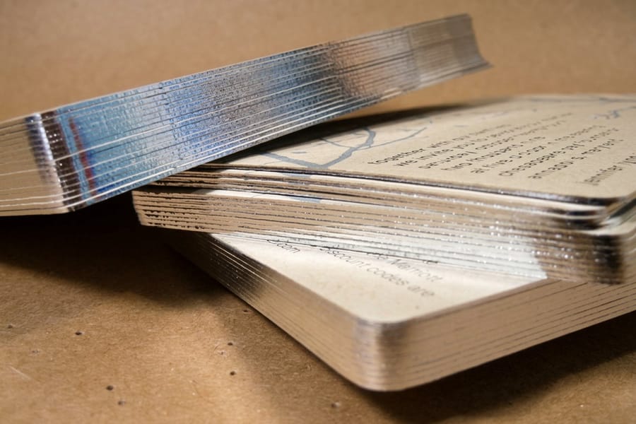 Edge gilded cards showing premium foil options from 4OVER4