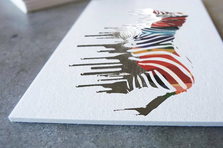 Thick fat foil business card that pairs heavy stock with metallic accents, from 4OVER4