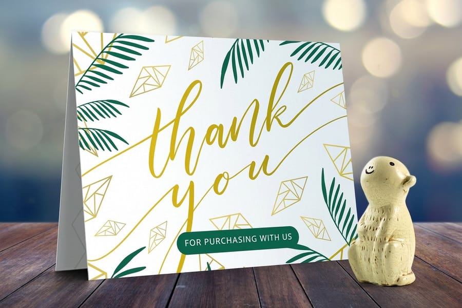 Folded thank-you card that frames a message across its panels, printed by 4OVER4