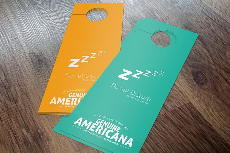 Two sided hotel door hangers printed by 4OVER4 with do not disturb and make up room faces
