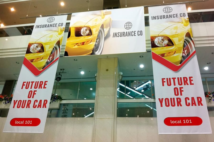 Indoor banner sized to fit its wall, printed by 4OVER4