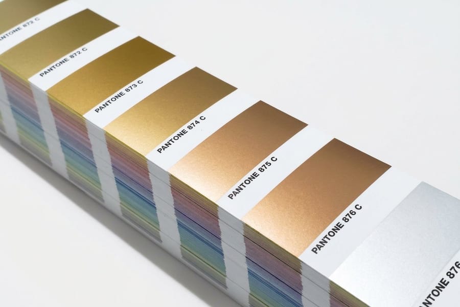 Metallic ink business card from 4OVER4 with a crisp printed logo