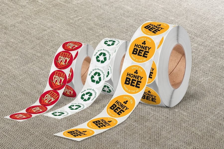 Roll round labels printed by 4OVER4 wound on a three inch core for a dispenser