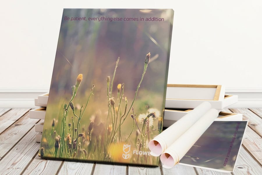 Rolled canvas printed by 4OVER4 unrolled beside its shipping tube
