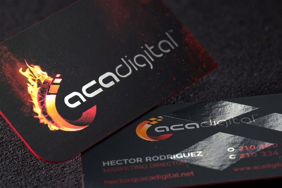 Silk aluminum foil business card with a mirror finish, printed by 4OVER4