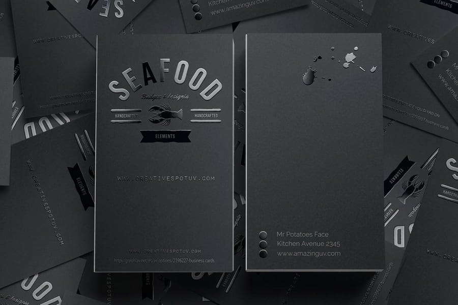 Spot UV business cards with a glossy raised finish from 4OVER4