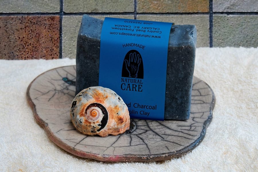 Standard soap labels printed by 4OVER4 wrapped around cured bars of handmade soap