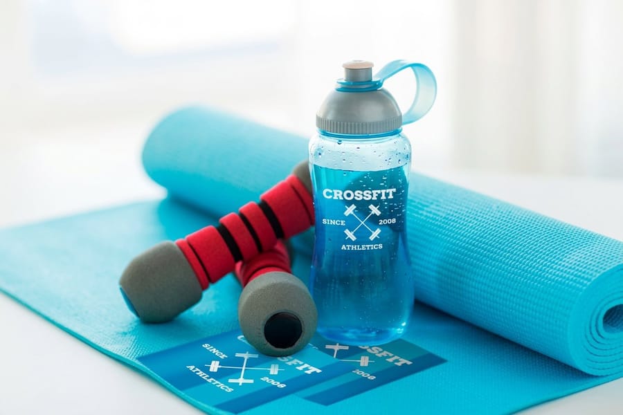 Standard waterproof labels printed by 4OVER4 on a bottle, the classic synthetic paper application