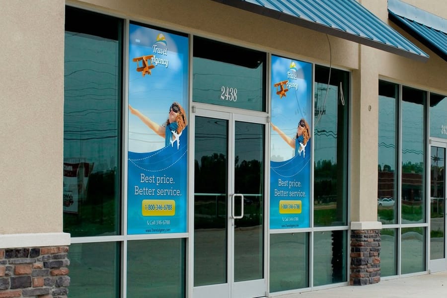 White window cling applied to clean glass by 4OVER4