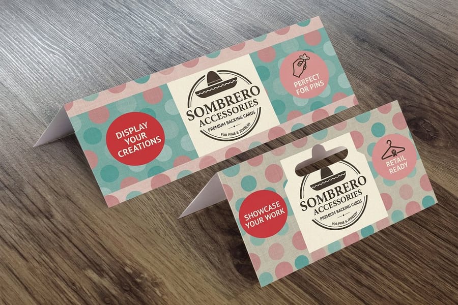 Printed backing cards from 4OVER4 holding small products for retail display