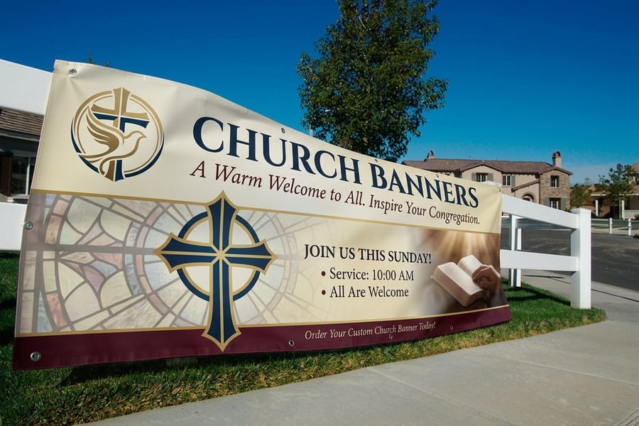 Church banner printed by 4OVER4 with hemmed edges and grommets ready for hanging