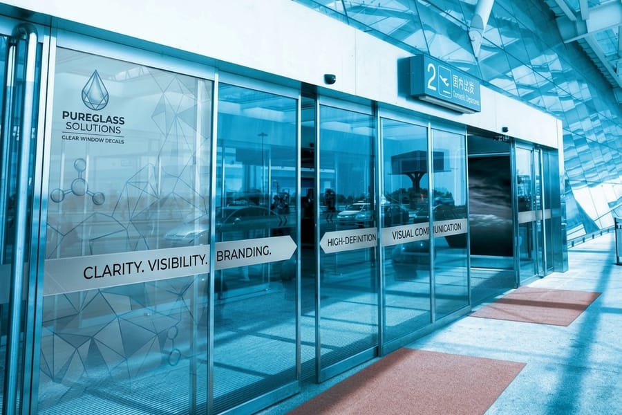 Clear window decals printed by 4OVER4 showing artwork on transparent vinyl