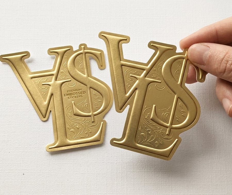 Embossed cards, folders, and hang tags printed by 4OVER4